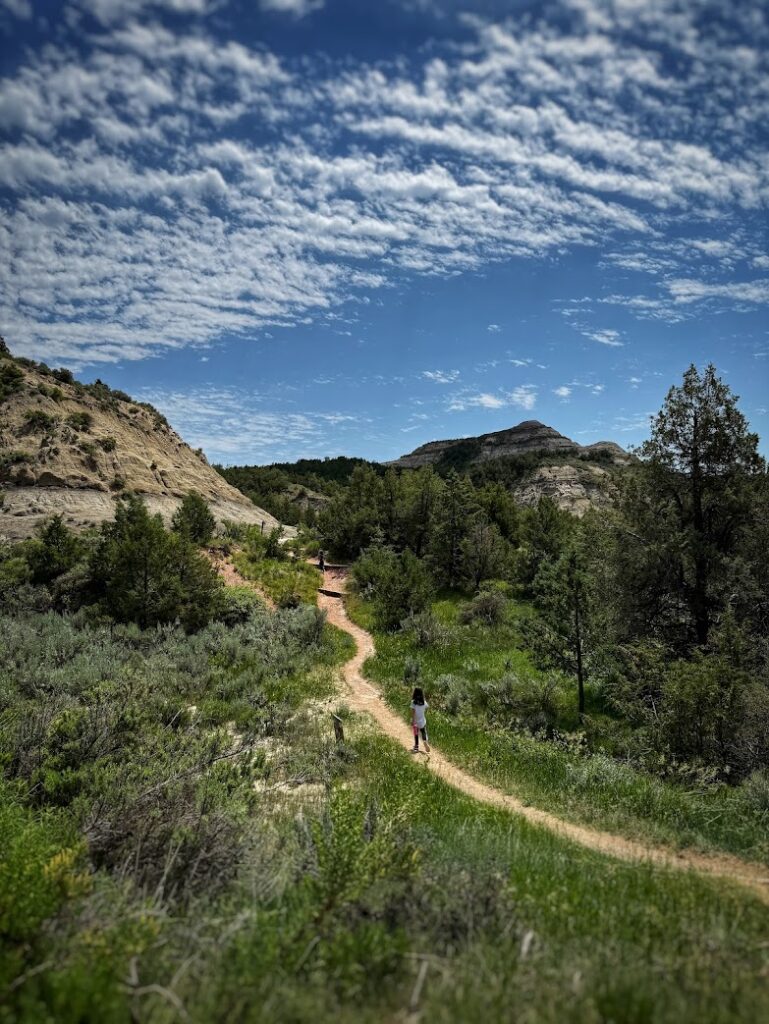 My daughter hiking on the Coal Vein Nature Trail in Theodore Roosevelt National Park 