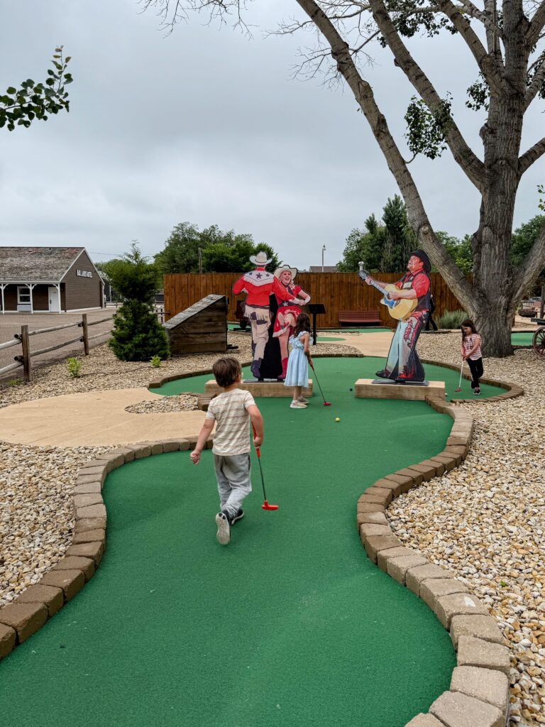 My family mini golfing at Point-to-Point Park 