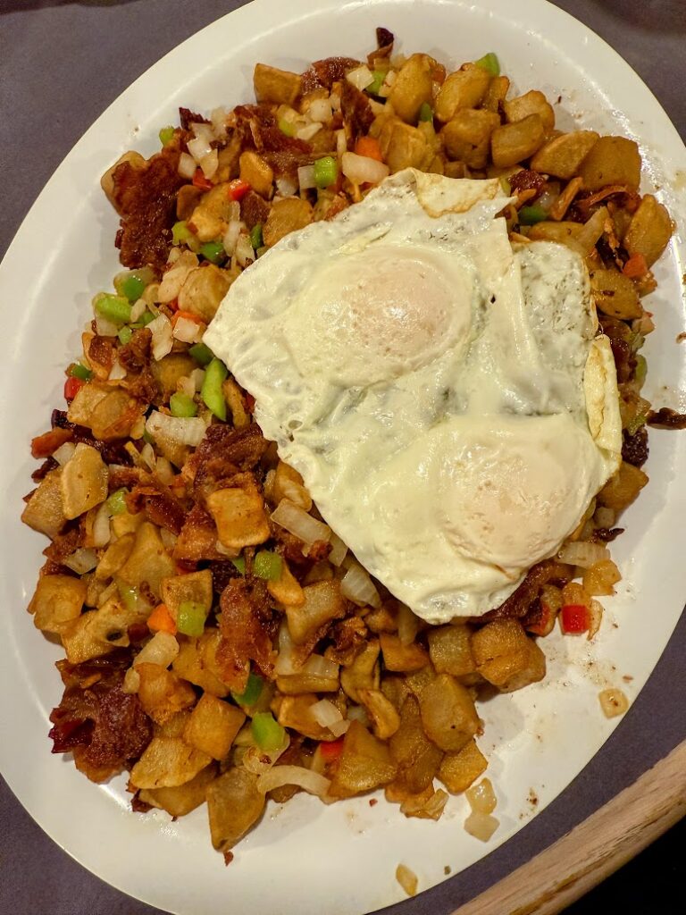 Hearty breakfast options like loaded hash browns and eggs show how delicious gluten free in Branson can be, even at classic diners.