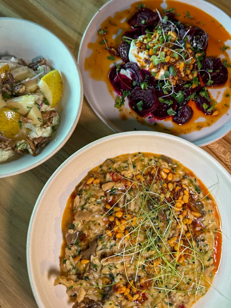 Gluten free Bentonville dining with beet salad, risotto, and seasonal vegetable dishes