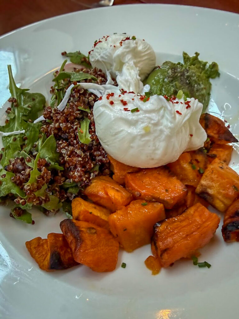 Gluten free brunch in Bentonville with poached eggs, roasted sweet potatoes, and quinoa salad