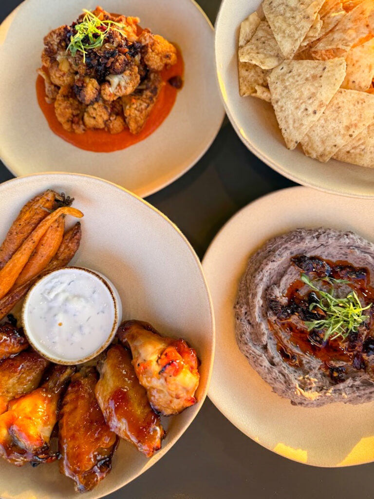 Gluten free small plates in Bentonville with cauliflower, wings, hummus, and chips